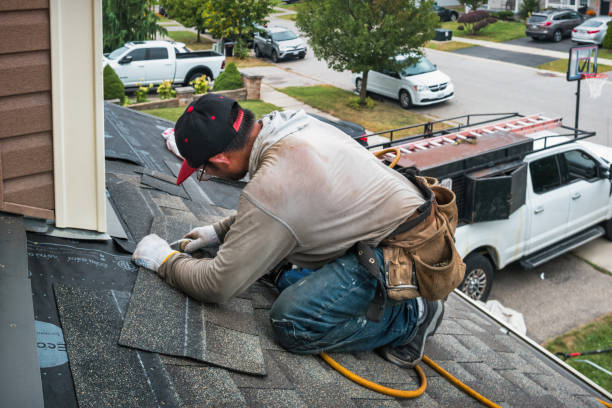 Professional Roofing technician working in Cobalt, ID